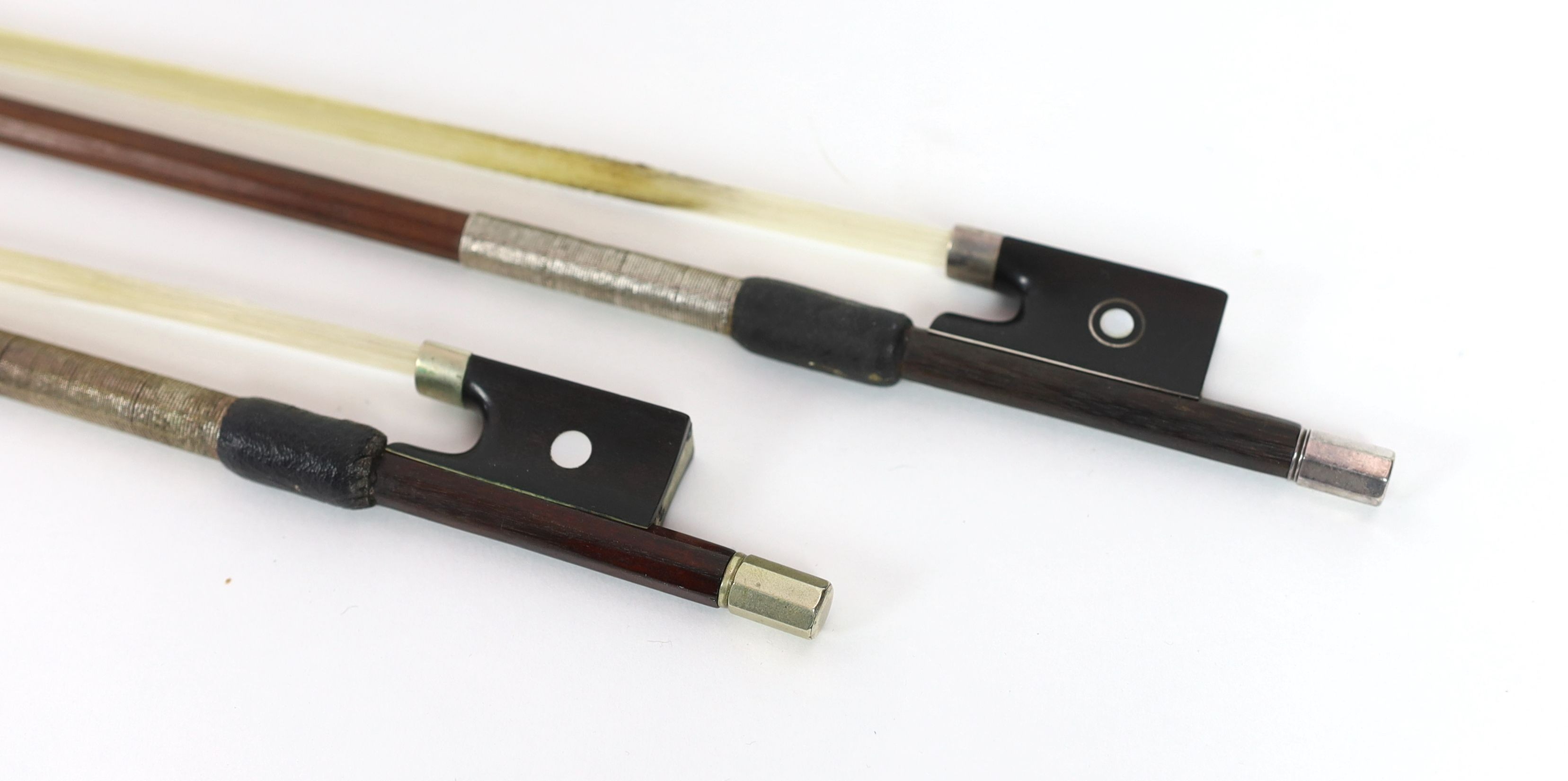 Two stamped violin bows, Both 74.5 cm long